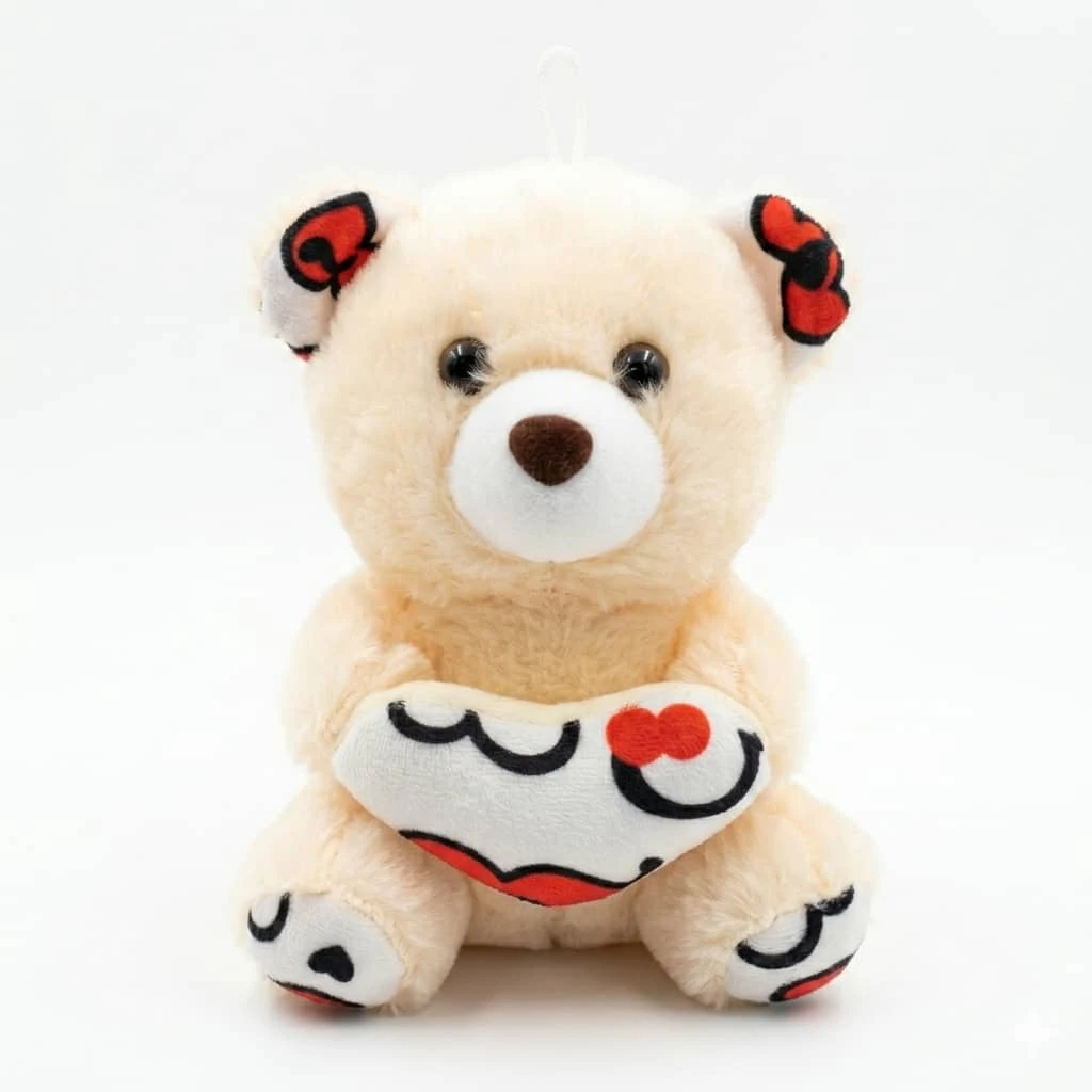 Peluche Osito Beige con Corazón Blanco's foto | 21 Boutique |  BizneCubano
